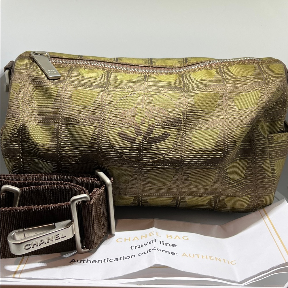 Chanel New Travel Line Mini Roll or Barrel Bag in a khaki or olive green color